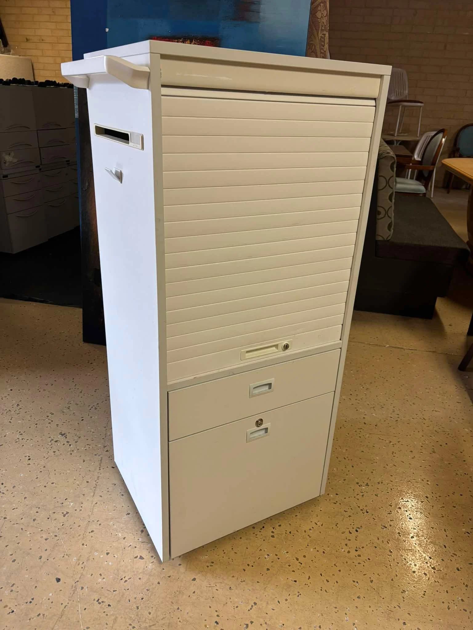 White Metal Roll‐Top Storage Cabinet Price to List: $100 each Quantity: 50+ available